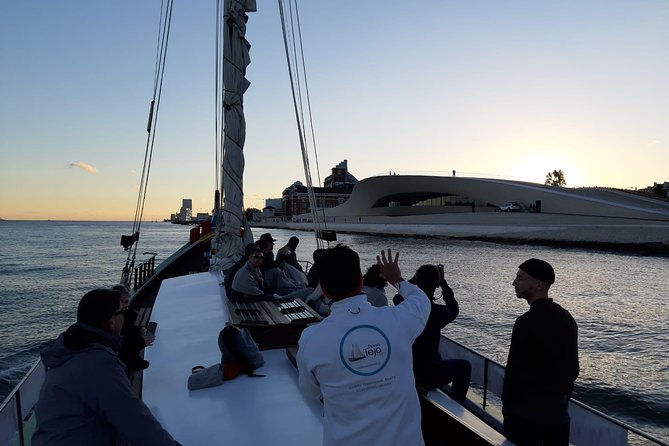 2-Hour Lisbon Traditional Boats Sunset Cruise with White Wine - Belém Tower, Jerónimos Monastery area, and the Age of Discoveries vibe