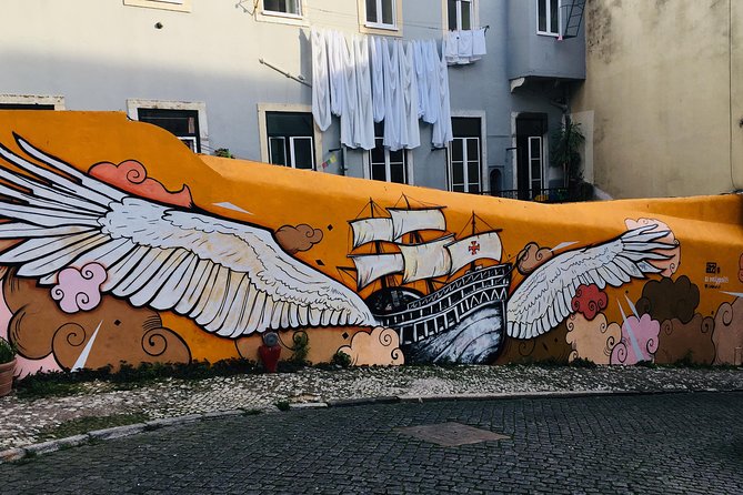3-Hour Guided Street Art Walking Tour of Lisbon - Stop 3: Baixa Tiles and Cobblestones, Where Symbols Mean Something