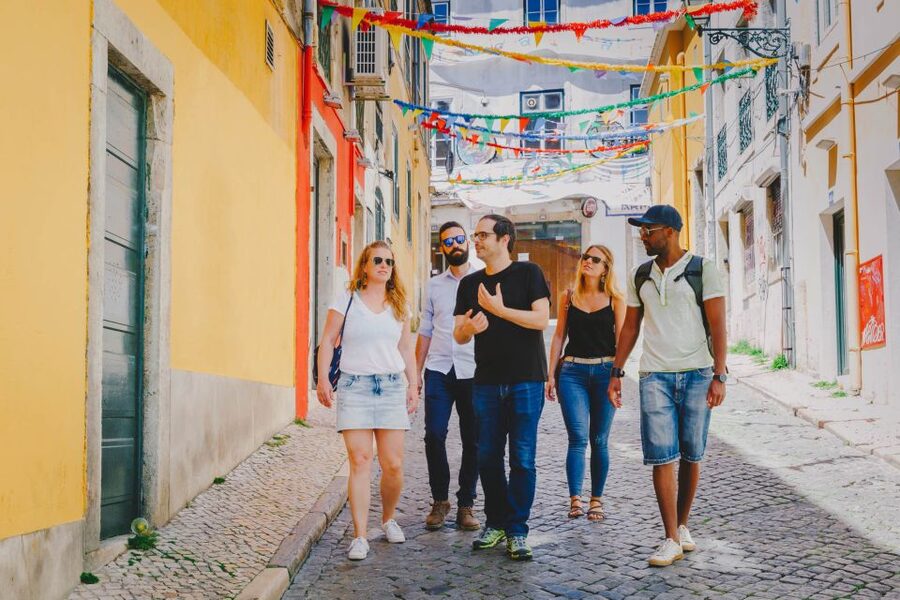 Best of Lisbon Walking Tour: Rossio, Chiado & Alfama - Starting at Rossio Square, then spotting neo-Manueline Lisbon at Rossio Station
