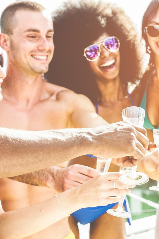 Boat Party to the Beach with Swimming Stops, DJ and Open Bar - Staff and Safety: Friendly, Professional, and Watching the Details