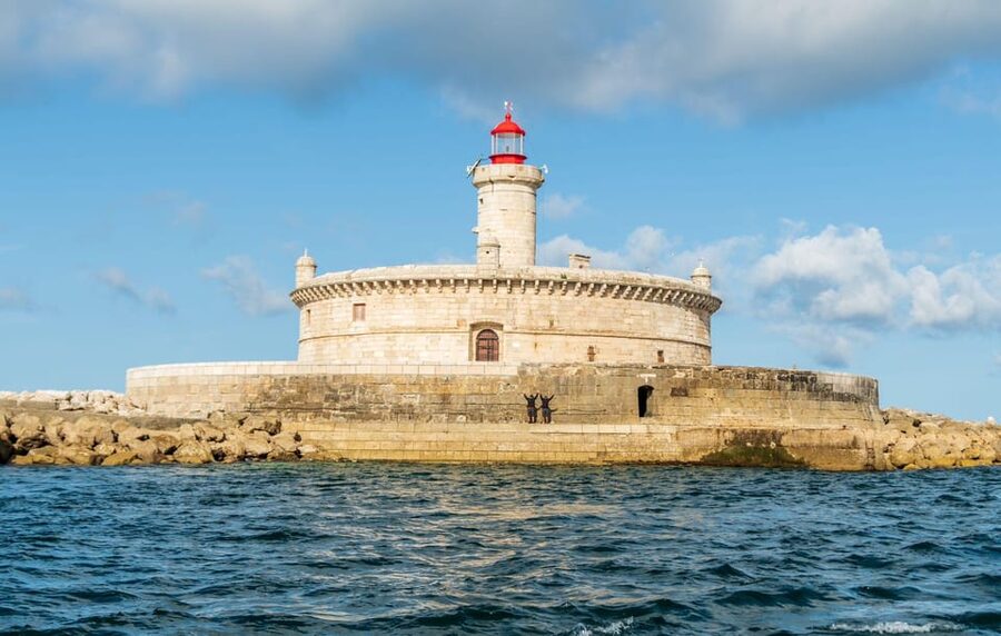 Boat tour: charming Cascais Coast to Lisbon lighthouse - São Julião da Barra and the forts that guarded Lisbon