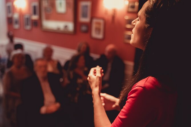 Fado Show with Port Wine at Historic Lisboa em Fado - Inside a microphone-free Fado concert with two singers and two guitars