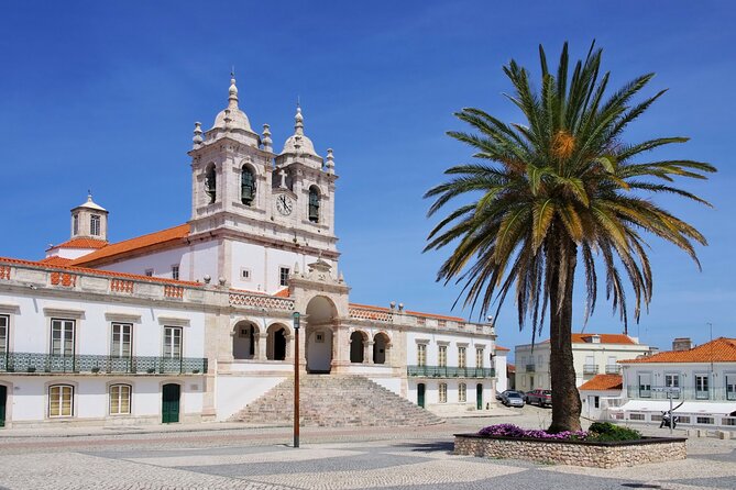 Fatima, Batalha, Nazare, Obidos Small Group Tour From Lisbon - Batalha UNESCO Cathedral: Gothic stone and victory on the walls