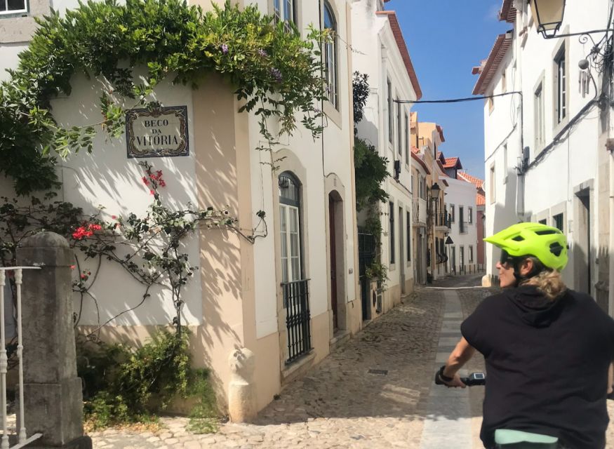 From Cascais: Sintra Guided E-Bike Tour & Guincho Beach - From pick-up to the ride start at Cidadela Art District