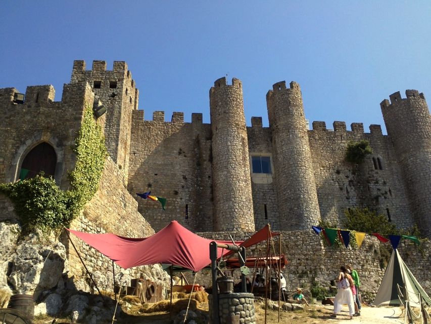 From Lisbon: Alcobaça & Óbidos Self-Guided Tour - The town gate and churches you should aim for