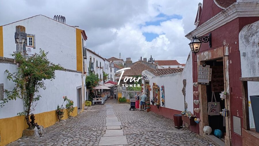 From Lisbon: Fátima, Batalha, Nazaré, & Óbidos. Private Tour - Nazaré: cliffside views, fishermen culture, and the giant wave story