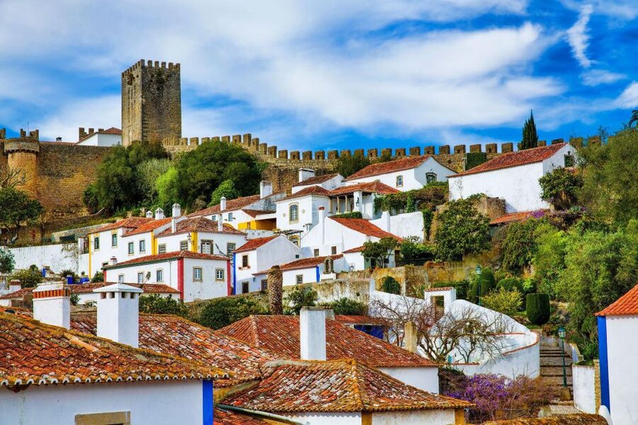 From Lisbon: Fátima, Óbidos Medieval, Nazaré Atlantic Coast - A one-day route that changes your whole mood