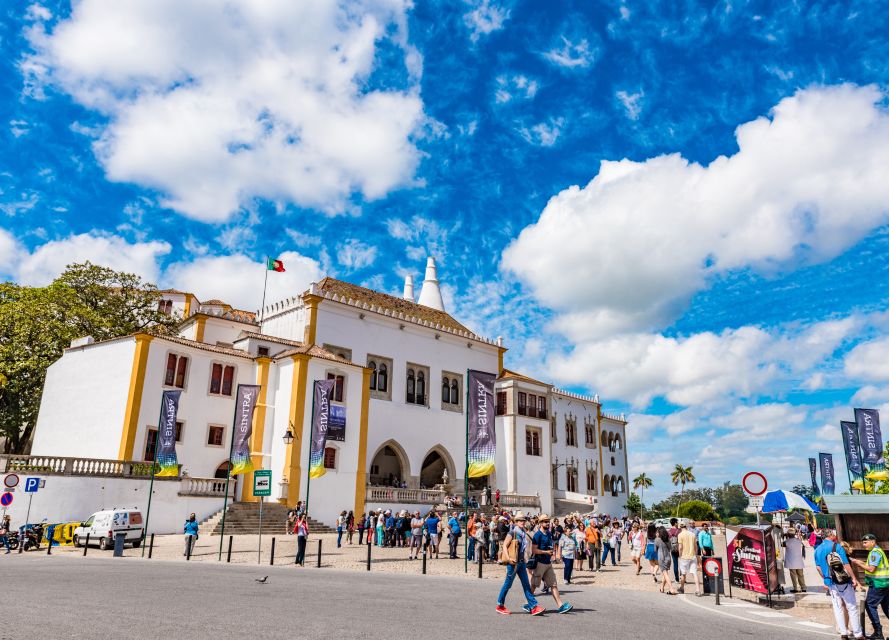 From Lisbon: Half-Day Private Sintra Cascais Tour - Pena Palace: whimsical architecture and big views