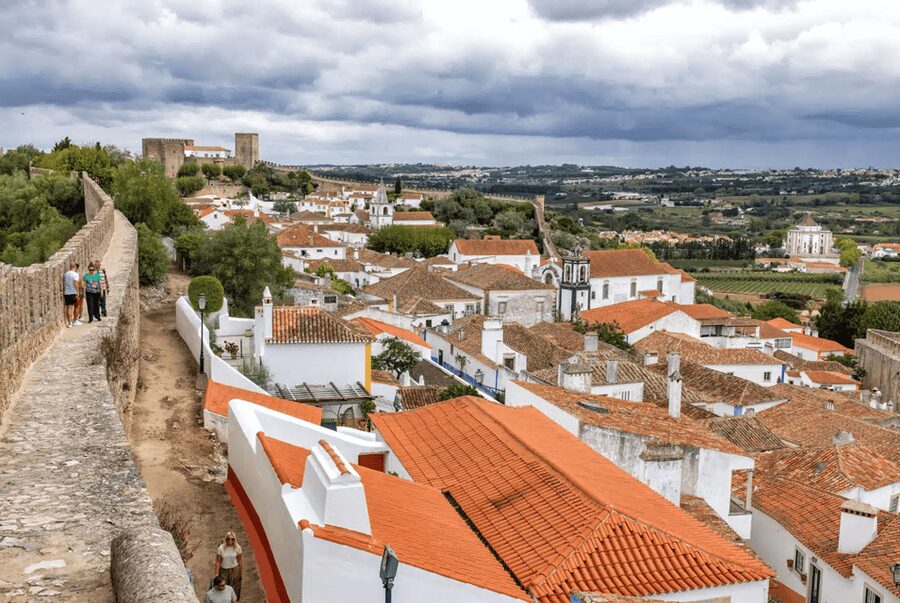 From Lisbon: Nazare Big Waves and Óbidos Guide Day Trip - Key moments to know before you go