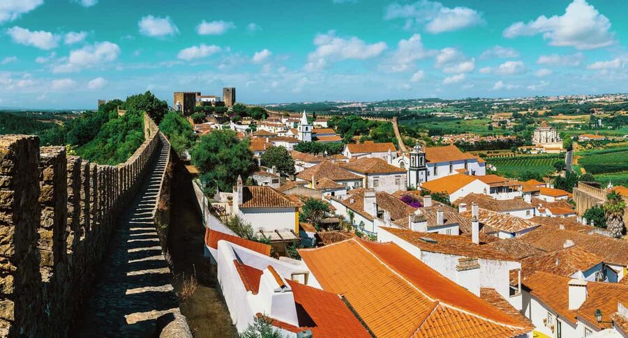 From Lisbon: Nazare Big Waves and Óbidos Guide Day Trip - Nazaré’s big-wave viewpoints: lighthouse, cliffs, and the Atlantic doing its thing