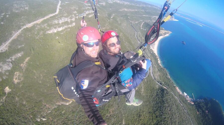 From Lisbon: Paragliding Flight with Transfers - Transfers and the Ferrari Shop meeting point