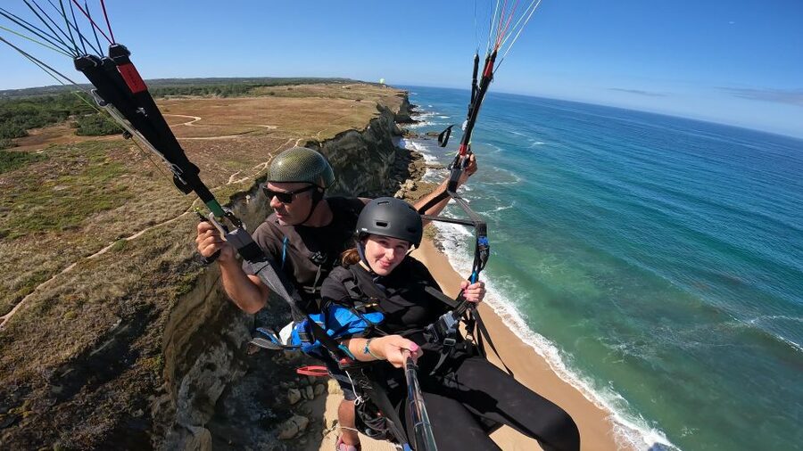From Lisbon: Paragliding Pack (Flight+Video+Transportation) - The briefing and demonstration: how they set you up to relax