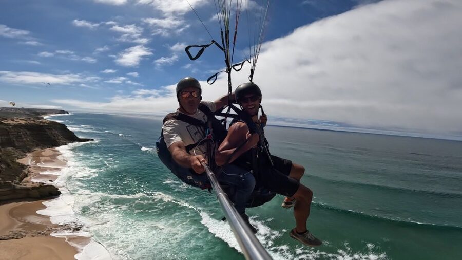 From Lisbon: Paragliding Pack (Flight+Video+Transportation) - Price and value: $206 for a flight plus the stuff that costs money