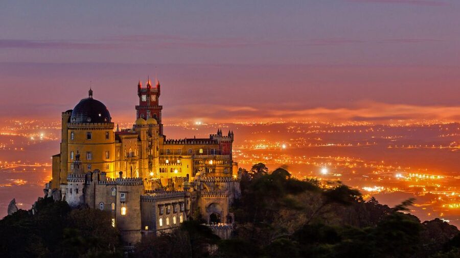 From Lisbon: Pena Palace, Regaleira, Sintra & Cascais Tour - Quinta da Regaleira: gardens, Moorish vibes, and optional add-on time