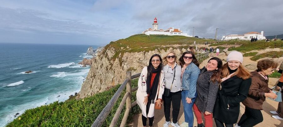 From Lisbon: Sintra, Pena, Regaleira, Roca and Cascais Tour - Cabo da Roca, Guincho Beach, and that lighthouse cliff moment