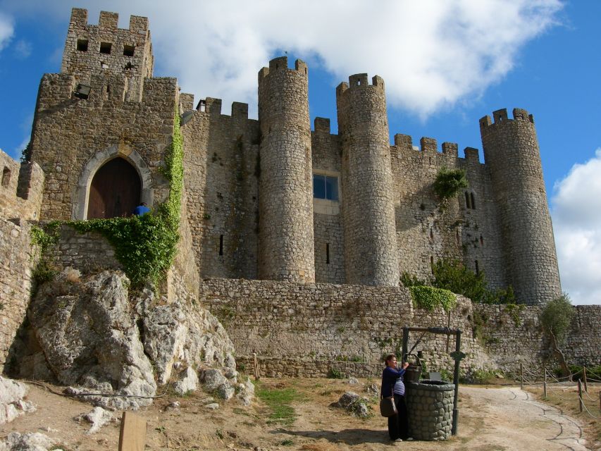 From Lisbon: Town-Hopping Transfer to Porto - Óbidos: medieval lanes and white-painted houses