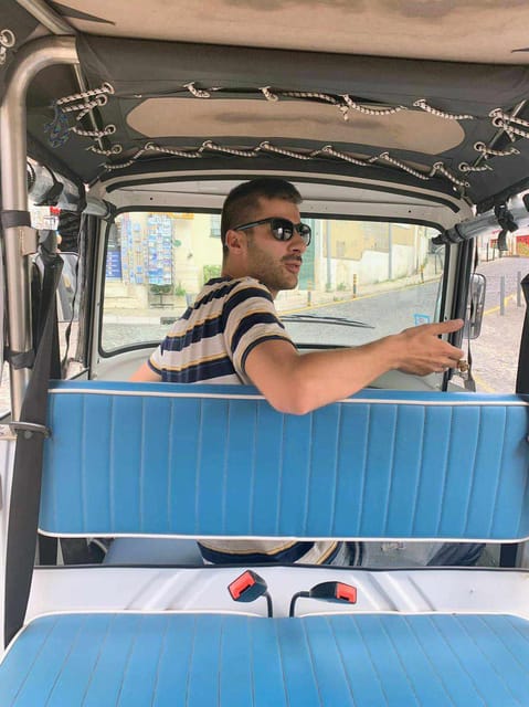 Guided Electric Piaggio Tuk-Tuk Tour of Historic Lisbon - Comfort, included insurance, and practical limits