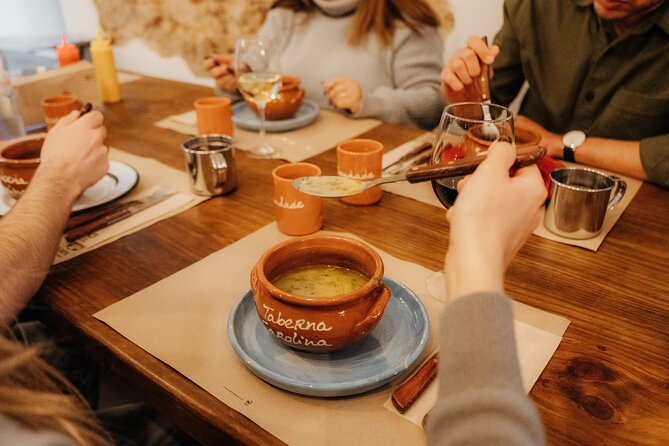 Heart of Lisbon Food Tour: Baixa, Chiado & Bairro Alto - Chiado’s underground former-church stop: beer, wine, and bifana in the middle of the action