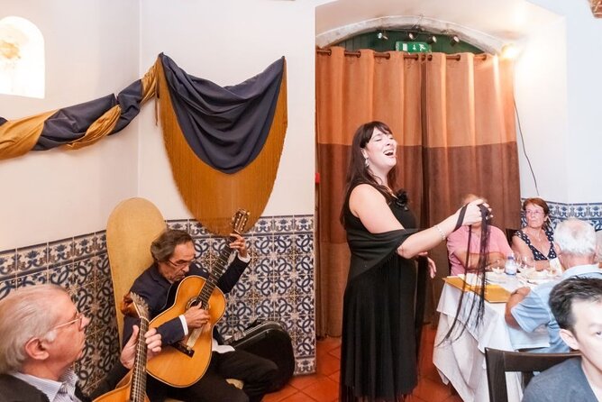 Lisbon: Authentic Fado Show, Dinner and Night Tour - Alfama After Dark, and a City Lights Panoramic Ride