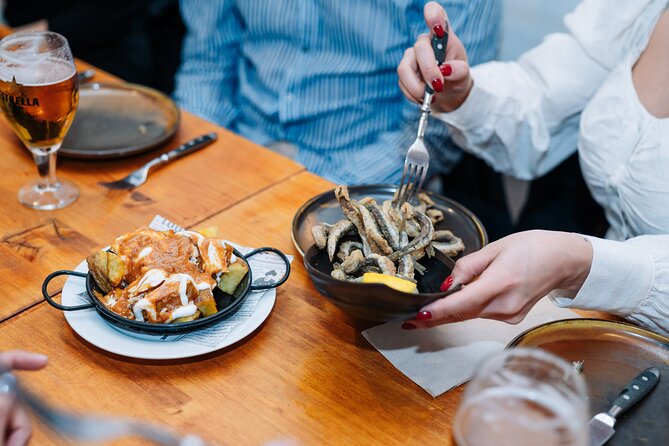 Lisbon: Award-Winning Guided Walking Food Tour with Local Drinks - Rua da Vitória Seafood Stop: Grilled Sardines and Seafood Rice