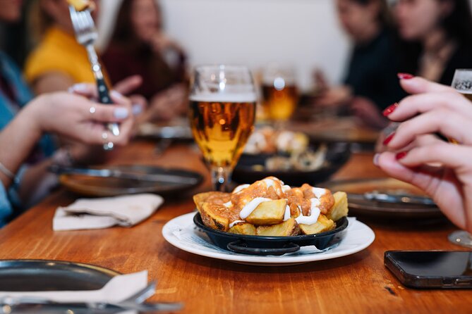 Lisbon: Award-Winning Guided Walking Food Tour with Local Drinks - Rua da Madalena Street Bites: Bifana, Coxinha, and Croquette Moments