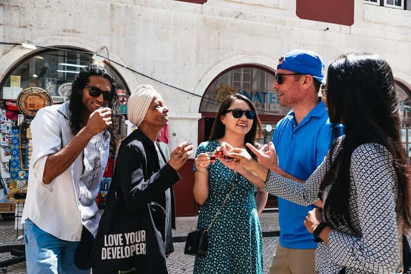 Lisbon: Baixa District Food Tour with Dinner and Drinks - Stop-by-stop: Praça Dom Pedro IV, St. Dominic’s Square, and Rua Augusta