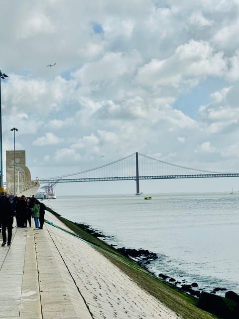 Lisbon: Belem Tour by TukTuk - Monument to the Discoveries and quick stops like the 25th April Bridge