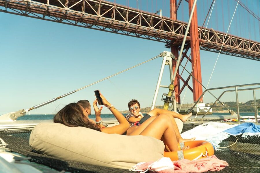 Lisbon: Catamaran Boat Party with Music, Open Bar & Dives - Key things to know before you go