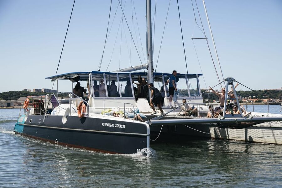 Lisbon: Catamaran Boat Party with Music, Open Bar & Dives - Getting to the boat: Doca de Santo Amaro, door 3 in Alcântara