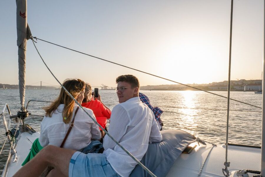 Lisbon: Daytime/Sunset/Night City Sailboat Tour with Drink - Drinks, music, and the small service details that people notice