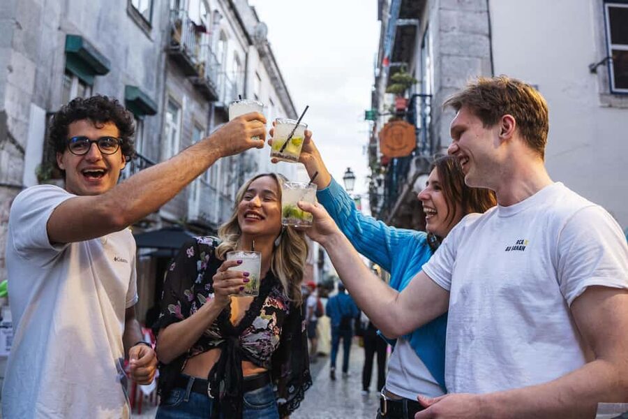 Lisbon: Drunken History Walking Tour with Included Drinks - End at the club, and what that means for your night plan