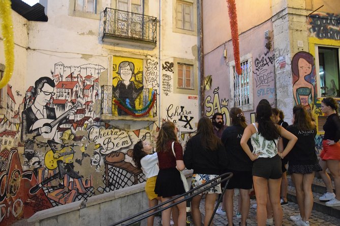 Lisbon Fado Experience: Walking Tour, Dinner and Live Music Show - Meeting at Rossio, then heading straight for the old-city streets
