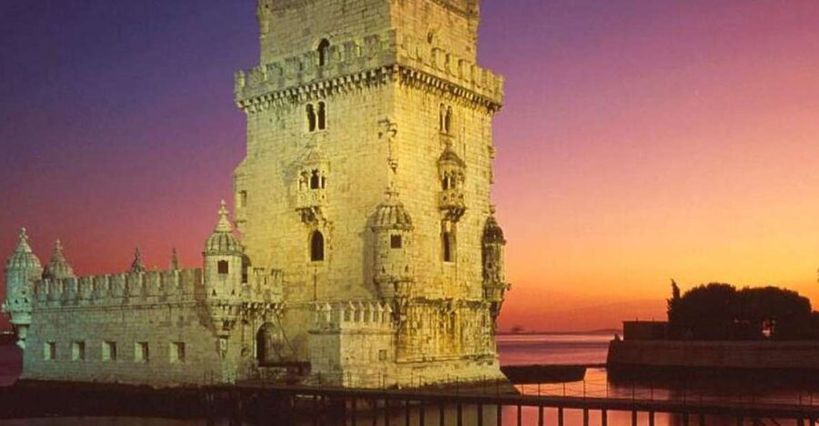 Lisbon: Fado Night Tour - Crossing the 25 de Abril Bridge after dark