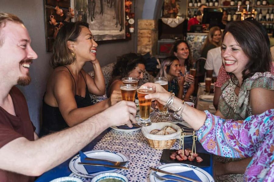 Lisbon: Food Crawl Walking Tour with Local Tastings - Drinks in four moves: ginjinha, vinho verde, and alcohol-free choices