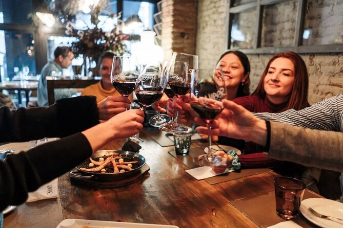 Lisbon Food Tour with Portuguese Wine: Taste the Best of Portugal - Rua da Vitória: Sardines, Seafood Rice, and Vinho Verde