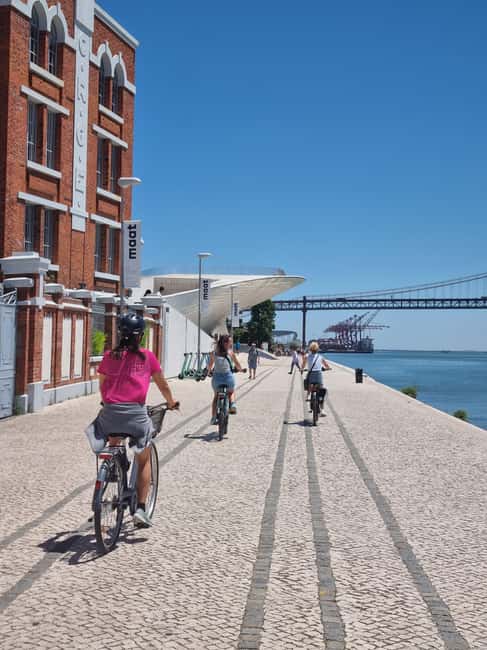 Lisbon: From the center to Belém by E-Bike - Belém Tower Stop: The Iconic Waterfront Landmark Moment