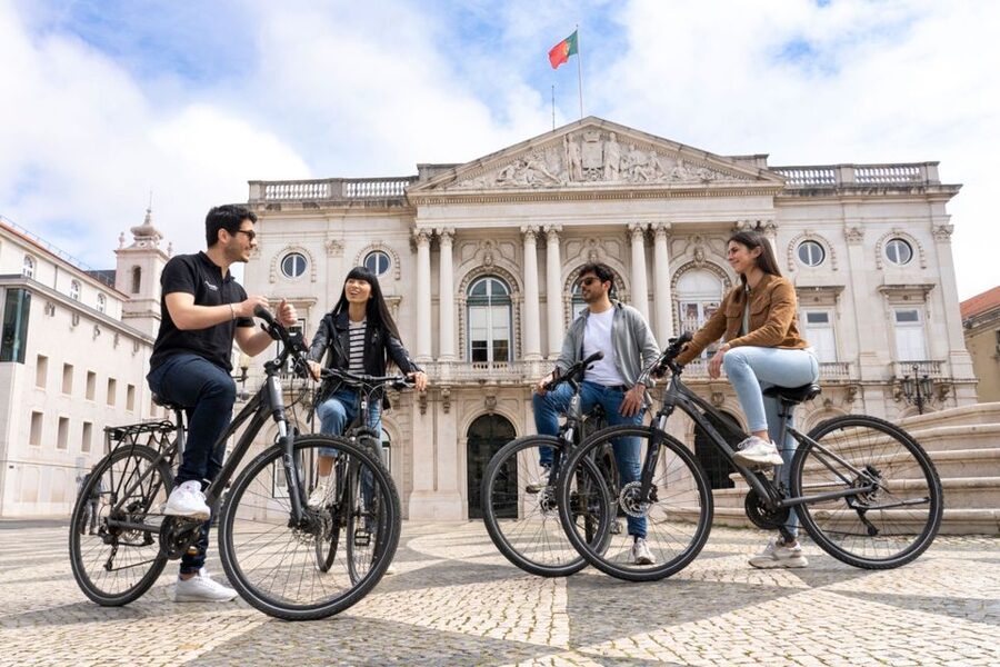 Lisbon: Guided Bike Tour, Helicopter Flight, and Boat Trip - Alfama and Cathedral Lisbon: oldest church energy without getting lost