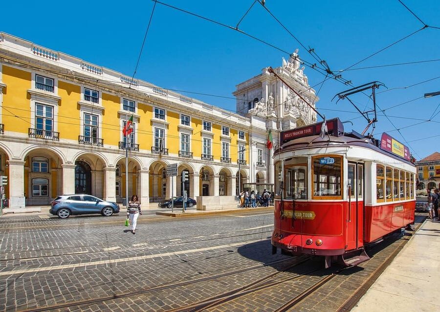 Lisbon: Guided Eco Tuk Tuk sightseeing tour - Rossio Square and Santa Justa Lift: A Fast Hit of Lisbon Energy