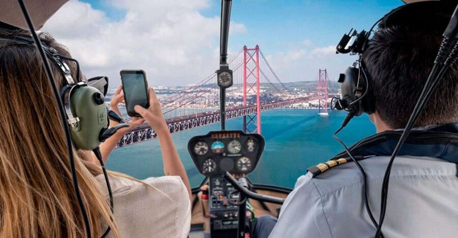 Lisbon: Helicopter Ride, Boat Trip, & Old Town Walking Tour - Lisbon walking tour: Praça do Comércio, St. Roque, Carmo Convent ruins, and Alfama’s old bones
