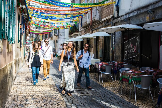 Lisbon Hidden Gems Walk: Traditions, Lunch and Ferry ride - Carmo Convent views with beer, and why Santa Justa lift is not included