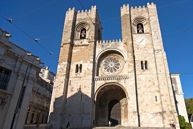 Lisbon Highlights - Private Tour with Van and Local Guide - Baixa by car and on foot: Liberdade, Príncipe Real, Bairro Alto, and Chiado