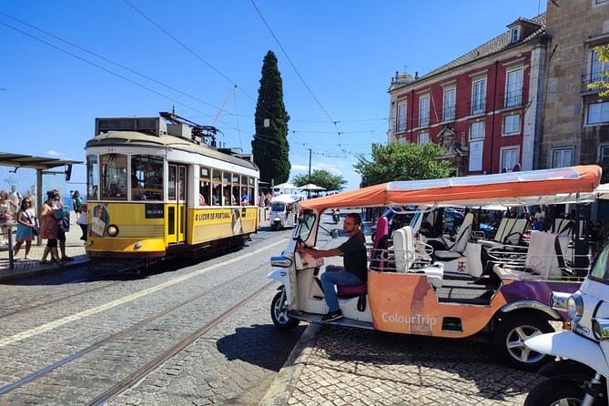 Lisbon Highlights: Private Tuk Tuk Tour Adventure Sightseeing - Miradouro Portas do Sol and the photo that explains Alfama