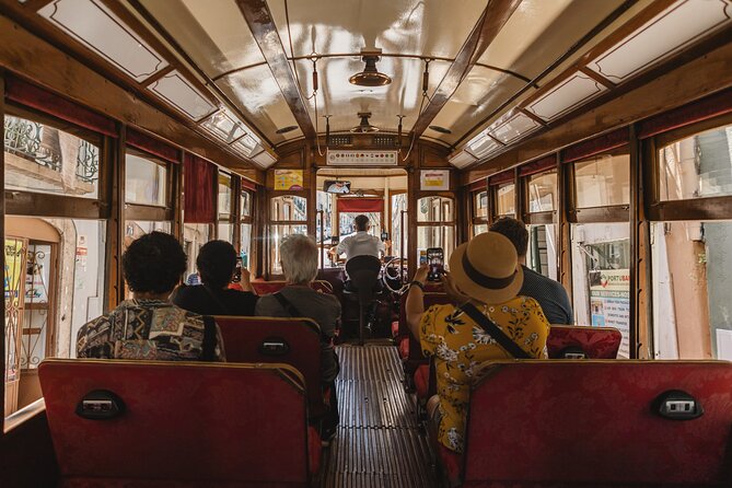 Lisbon Hills Red Tram by Tram 28 route - How the Headphones and English Audio Change the Experience