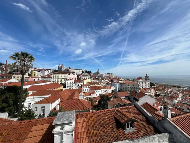 Lisbon: LISBON STORY TOUR BY TUK TUK - Portas do Sol, then Graça: tiled facades and stairway energy