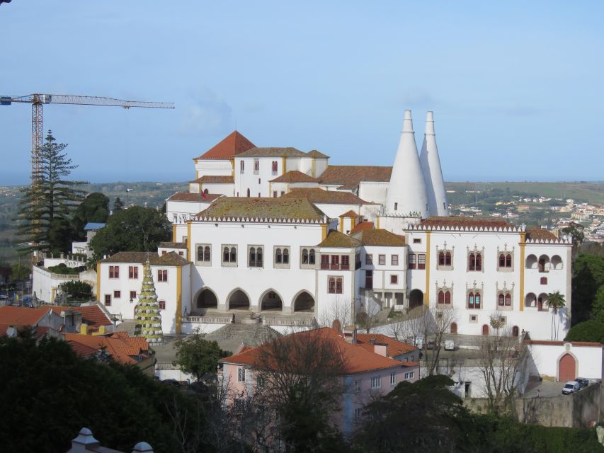Lisbon: Pena, Regaleira & Atlantic Coast Tour with a Local - Quinta da Regaleira: Initiation Well, symbols, and tunnels