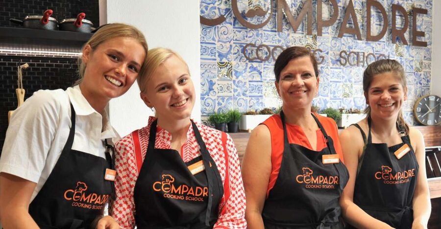 Lisbon: Portuguese Cooking Class for Beginners - Entering the Compadre Cooking School kitchen in Lisbon