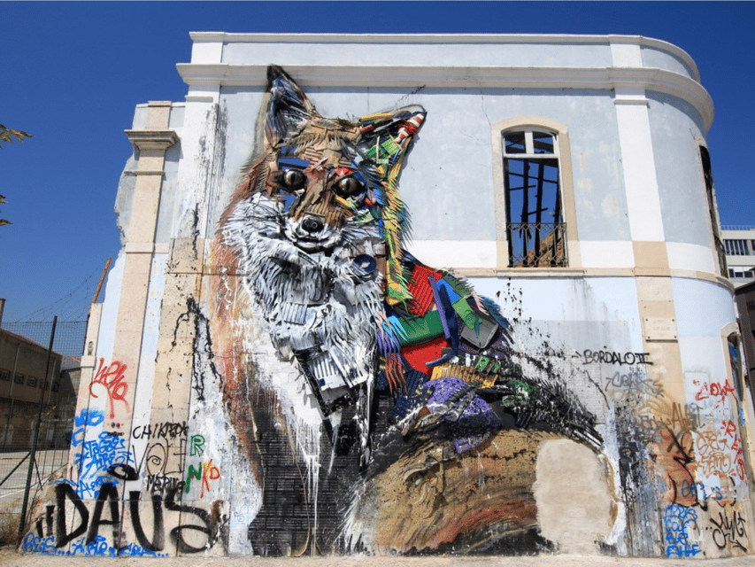 Lisbon: Private City Tour by Tuk-Tuk - Miradouro da Porta do Sol to Santa Luzia: short photo stops, big payoff