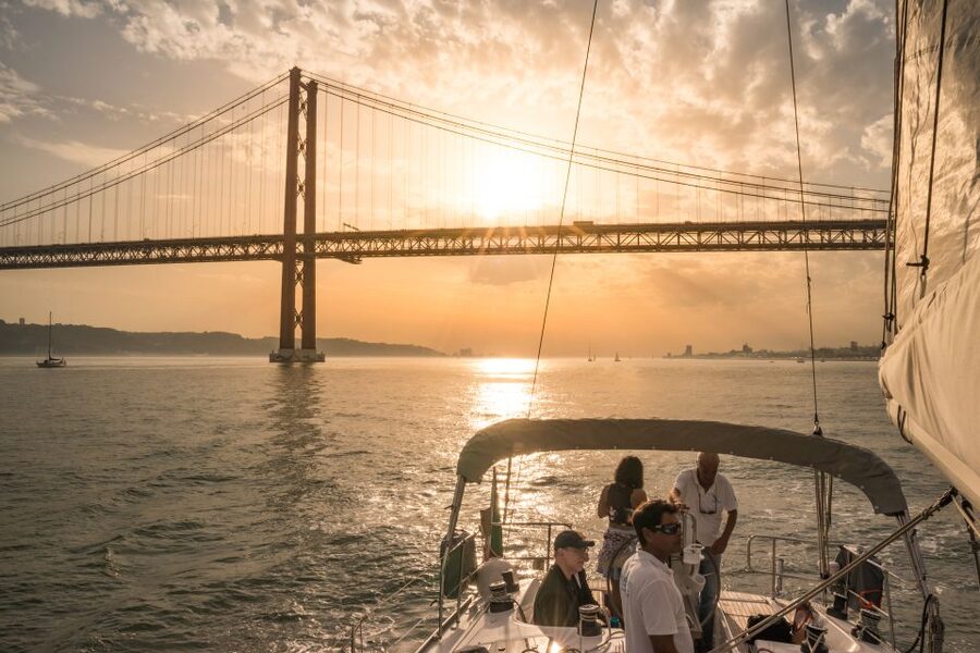 Lisbon: Private Sunset Cruise on the Tagus River with Drink - Vasco da Gama Bridge and the slow ride back to Belém