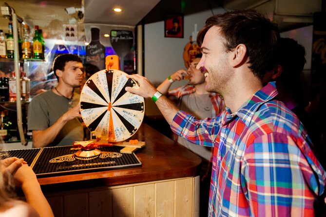 Lisbon: Pub Crawl with Open Bar, Shots & VIP Club Entry - Calle Rosa de Lisboa for shots, music, and a quick reset