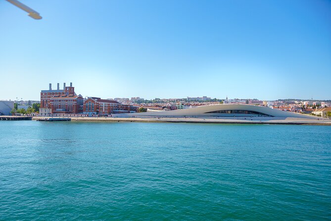 Lisbon River Boat Sightseeing Tour with a Drink - 25 de Abril Bridge, the Golden Gate color moment